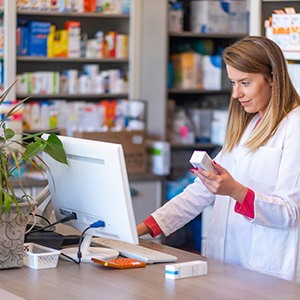 a pharmacist filling a prescription