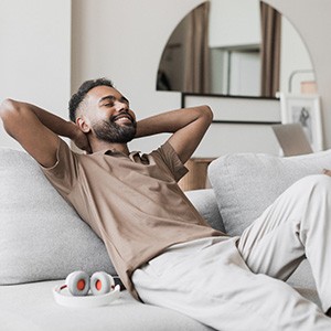 a man relaxing on a couch